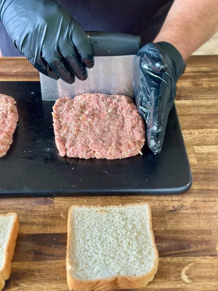 forming french onion burgers into patties