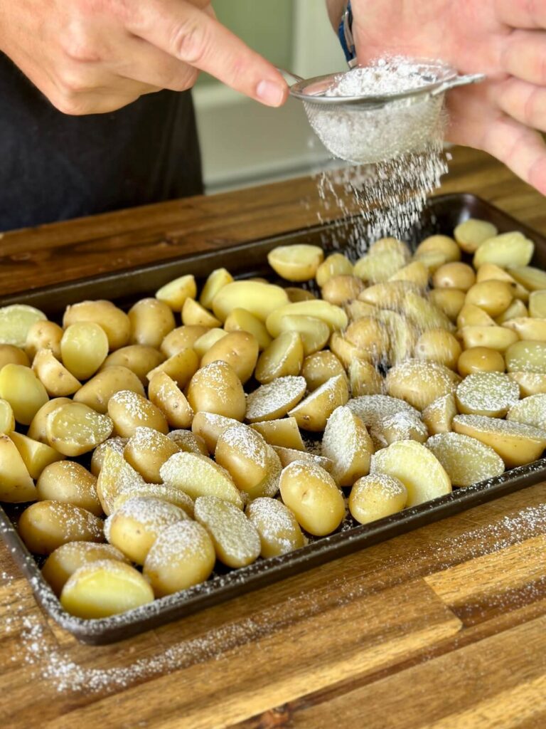dusting boiled potatoes with flour