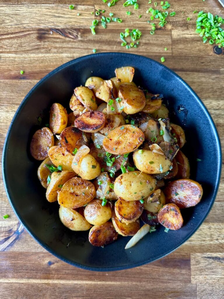 cowboy butter potatoes made on a Blackstone griddle