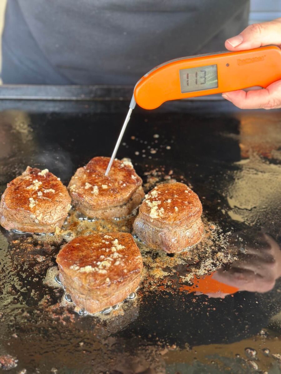 using instant read thermometer to check internal temp of filets on Blackstone
