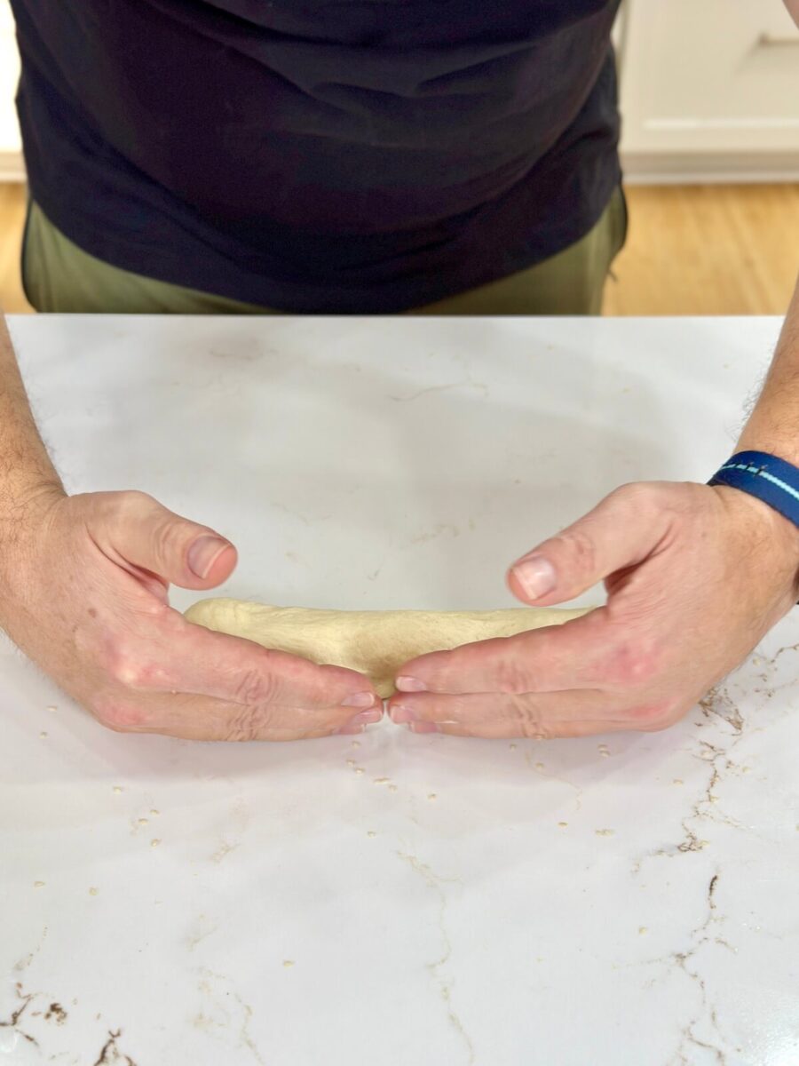shaping dough for hoagies