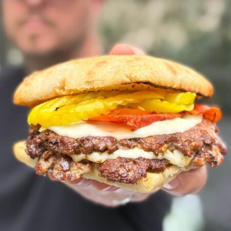 pizza smash burger with marinara sauce, pepperoni, and provolone on ciabatta roll