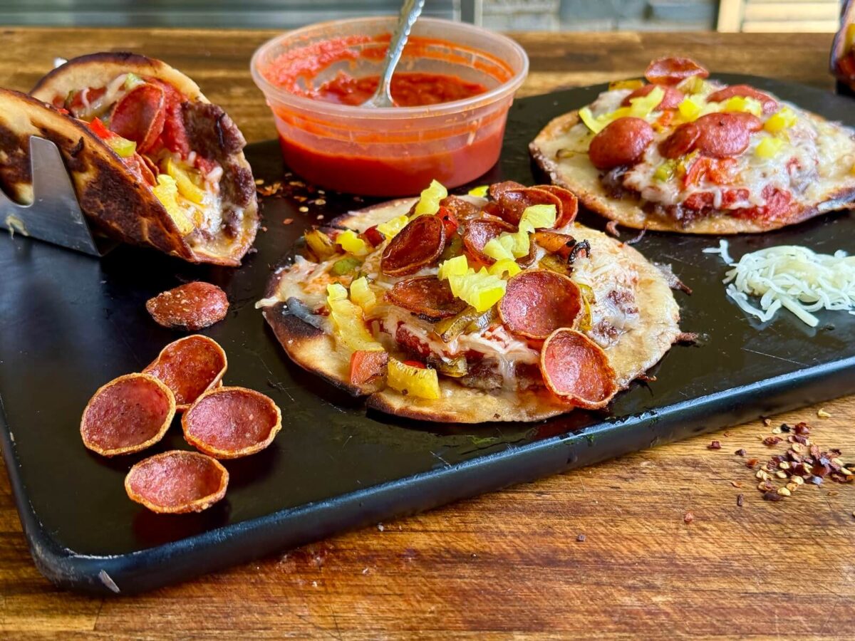 mini pizzas made on tortillas and folded in the shape of tacos
