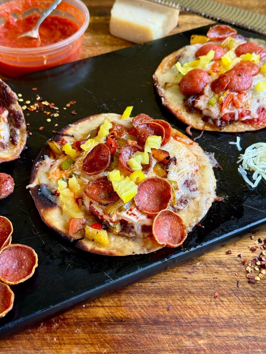 mini pizzas with flour tortilla crust, ground meats, marinara sauce, pepperoni, and other pizza toppings