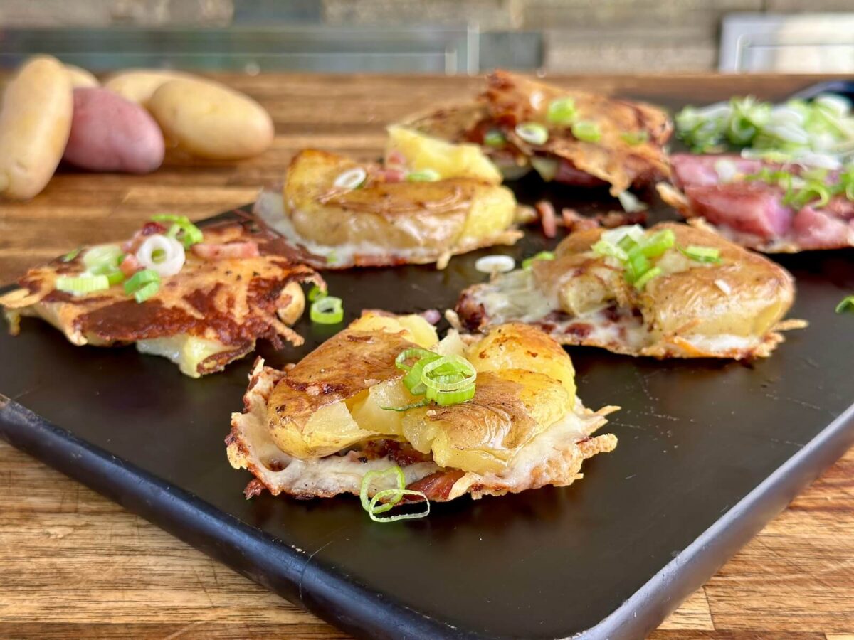 smashed potatoes with parmesan cheese and sliced green onions