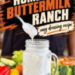Jar of creamy homemade buttermilk ranch surrounded by fresh vegetables, with a spoonful of dressing and text reading “Homemade Buttermilk Ranch—easy dressing recipe.”