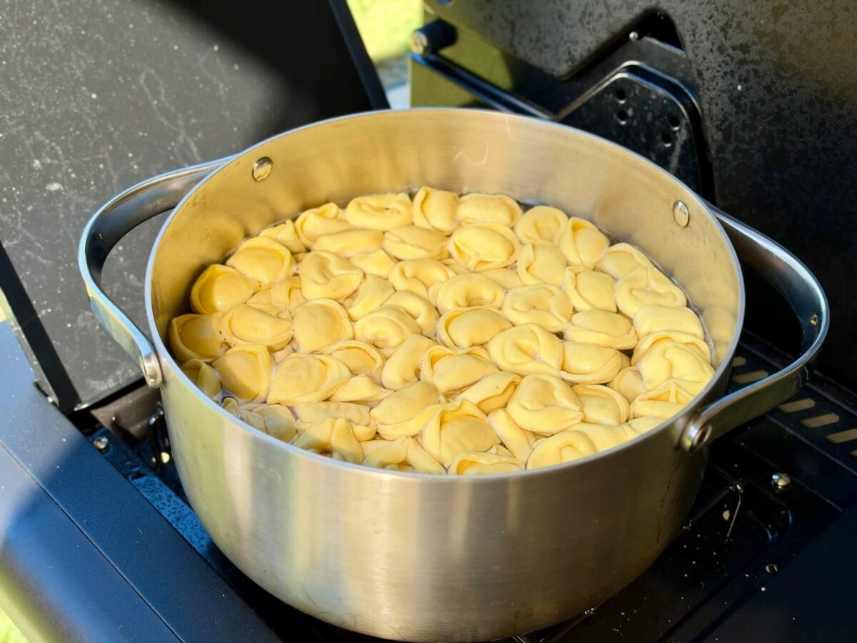 boiling cheese tortellini in a pot of water